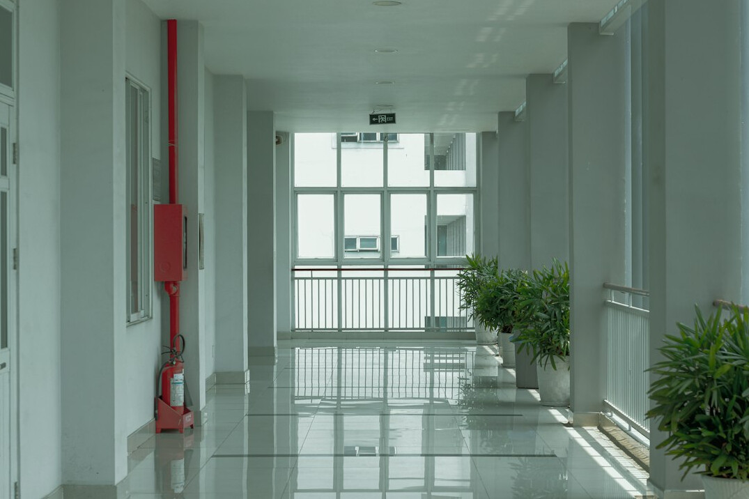 Bright modern office reception area with seating